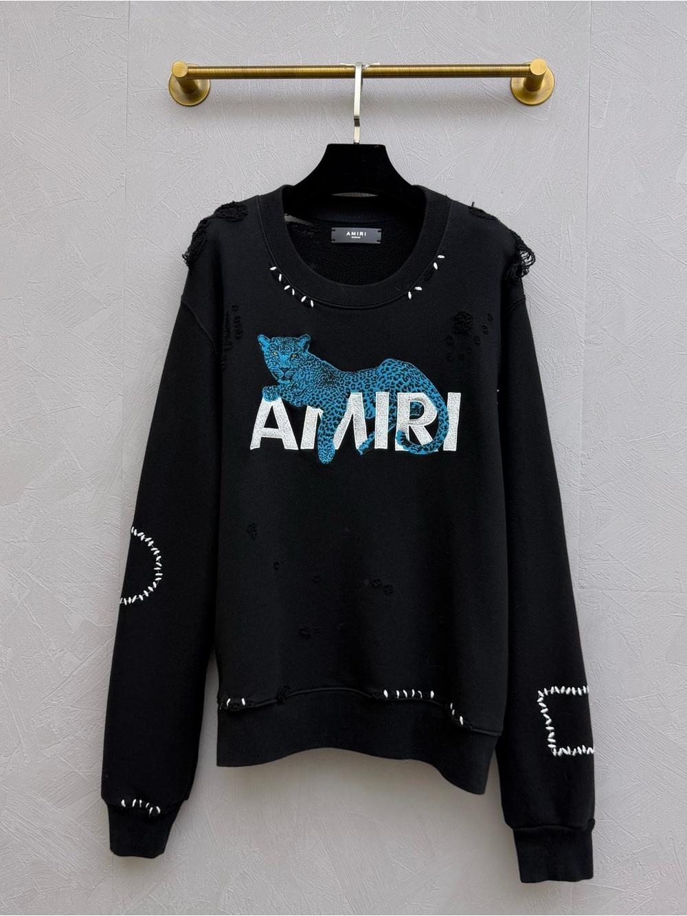 AMIRI Black Crewneck Sweater with Blue Leopard Motif